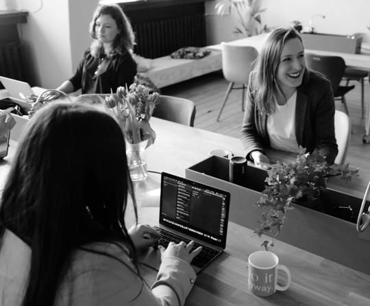 image of girls working in an office